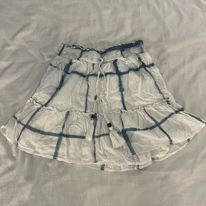 blue and white flowey skirt.